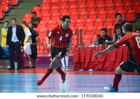 BANGKOK,THAILAND-NOVEMBER 06: Mostafa Naden (no.6) of Egypt celebrates whit team mate during the FIFA Futsal World Cup Egypt and Czech Republic at Indoor Stadium Huamark on Nov6,2012 in ,Thailand.
