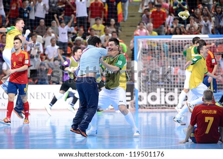 BANGKOK,THAILAND - NOVEMBER18:Players (yellow) of Brazil celebrates with team mate  the FIFA Futsal World Cup Final between Spain and Brazil at Indoor Stadium Huamark on Nov18, 2012 in ,Thailand.