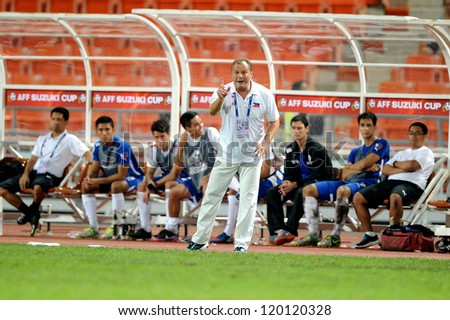 BANGKOK THAILAND-NOVENBER 24:Head Coach Hans Michael Weib of Philippines (white) look on during the AFF Suzuki Cup between Thailand and Philippines at Rajamangala stadium on Nov24, 2012 in ,Thailand.