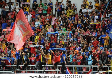BANGKOK THAILAND-NOVENBER 24:Unidentified fans of Thailand Flag supporters during the AFF Suzuki Cup between Thailand and Philippines at Rajamangala stadium on Nov24, 2012 in,Thailand.