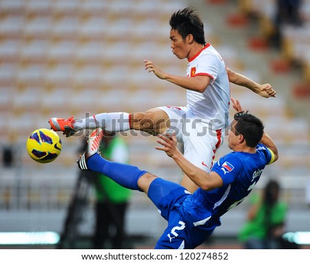 BANGKOK THAILAND-NOVENBER 27:Le Tan Tai (white) of Vietnam in action during  the AFF Suzuki Cup between Vietnam and Philippines at Rajamangala stadium on Nov27, 2012 in,Thailand.