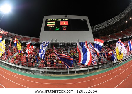 BANGKOK THAILAND-NOVEMBER 30:Unidentified of Thailand Flag supporters during the AFF Suzuki Cup between Vietnam and Thailand at Rajamangala stadium on Nov30, 2012 in Bangkok,Thailand.