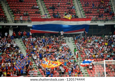 BANGKOK THAILAND-NOVEMBER 30:Unidentified of Thailand Flag supporters during the AFF Suzuki Cup between Vietnam and Thailand at Rajamangala stadium on Nov30, 2012 in Bangkok,Thailand.