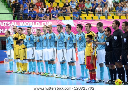 BANGKOK,THAILAND-NOVEMBER 11: Thailand players  looks on the national anthem during the FIFA Futsal World Cup between Thailand and Spain at Nimibutr Stadium on November 11, 2012 in Bangkok, Thailand.