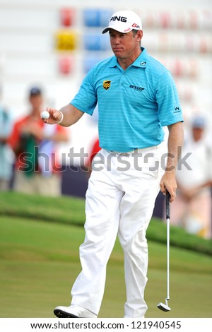 CHONBURI,THAILAND-DECEMBER 6: Lee Westwood of England gestures to his fans during hole 9 day one of the Thailand Golf Championship at Amata Spring Country Club on December 6,2012 in Chonburi,Thailand.