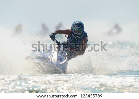 PATTAYA CITY THAILAND-DECEMBER 8:Mizuo Hidaka of Japan in action during moto2 class Pro Ski Open the Jetski  King\'s Cup World Cup Grand Prix at Jomtien Beach on Dec8, 2012 in,Thailand.