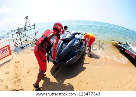 PATTAYA CITY THAILAND-DECEMBER8:Unidentifie Water Rescue in action during the Jetski  King\'s Cup World Cup Grand Prix at Jomtien Beach on Dec8,2012 in,Thailand.
