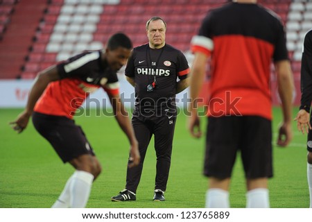 BANGKOK,THAILAND-JANUARY 6:Coach Dick Advocaat (L2) of PSV  n action during training  ahead of The AIA Champions Cup match between SCG Muangthong Utd. and PSV at SCG Stadium on Jan6,2012 in ,Thailand.