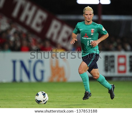 NONTHABURI,THAILAND-MAY01:Marcio Richardes of Urawa Red Diamonds control the ball during the AFC Champions League between Muangthong Utd.and Urawa Red Diamonds at SCG Stadium on May1,2013 in,Thailand.
