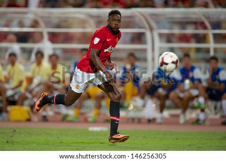 BANGKOK,THAILAND-JULY13: Danny Welbeck of Manchester United run with the ball during the friendly match between Singha All Star and Manchester United at Rajamangala Stadium on July13,2013in Thailand.