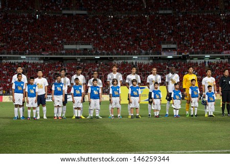 BANGKOK THAILAND-JULY13:Players of Singha All Star XI looks on prior to the friendly match between Singha All Star XI and Manchester United at Rajamangala Stadium on July13,2013 in Thailand.