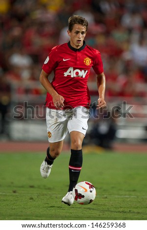 BANGKOK THAILAND-JULY13:Adnan Januzaj of Manchester United control the ball during the friendly match between Singha All Star XI and Manchester United at Rajamangala Stadium on July13,2013in Thailand.