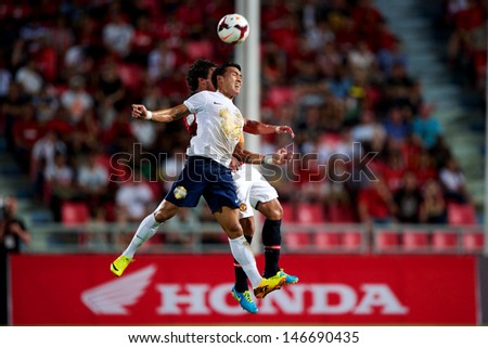 BANGKOK THAILAND-JULY13:Teeratep Winothai of Singha All Star XI in action during the friendly match between Singha All Star XI and Manchester United at Rajamangala Stadium on July13,2013 in Thailand.