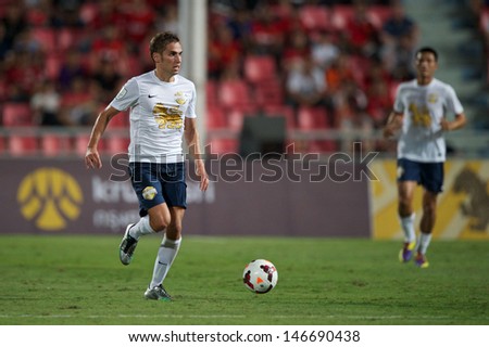 BANGKOK THAILAND-JULY13:Mario Djurovski of Singha All Star XI in action during the friendly match between Singha All Star XI and Manchester United at Rajamangala Stadium on July13,2013 in Thailand.