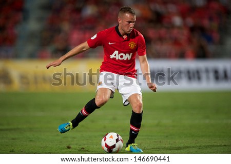 BANGKOK THAILAND-JULY13:Tom Cleverley  of Manchester United in action during the friendly match between Singha All Star and Manchester United at Rajamangala Stadium on July13,2013 in Thailand.