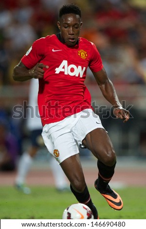 BANGKOK THAILAND-JULY13:Daniel Welbeck of Manchester United run with the ball during the friendly match between Singha All Star and Manchester United at Rajamangala Stadium on July13,2013 in Thailand.