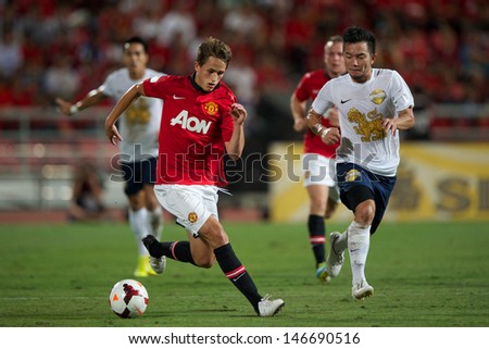 BANGKOK THAILAND-JULY13:Adnan Januzaj of Manchester United control the ball during the friendly match between Singha All Star and Manchester United at Rajamangala Stadium on July13,2013 in Thailand.