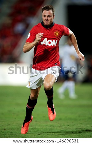 BANGKOK THAILAND-JULY13:Jonny Evans of Manchester United run during the friendly match between Singha All Star XI and Manchester United at Rajamangala Stadium on July13,2013 in Thailand.