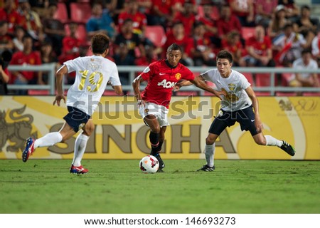 BANGKOK,THAILAND-JULY13: Jesse Lingard (C) of Manchester United in action during the friendly match between Singha All Star and Manchester United at Rajamangala Stadium on July 13, 2013 in Thailand.
