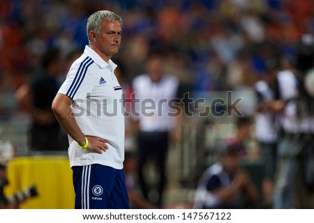 Bangkok,Thailand-Ju Ly17:Manager Jose Mourinho Of Chelsea Look On During The International Friendly Match Chelsea Fc And Singha Thailand All-Star At The Rajamangala Stadium On July17,2013 In Thailand.