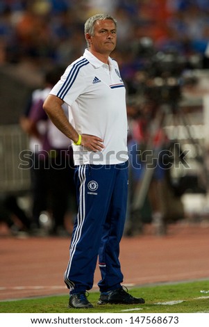BANGKOK,THAILAND-JULY17:Manager Jose Mourinho of Chelsea look on during the international friendly match Chelsea FC and Singha Thailand All-Star at the Rajamangala Stadium on July17,2013 inThailand.