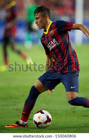BANGKOK,THAILAND-AUGUST 07:Neymar JR of Barcelona in action during the international friendly match between Thailand XI and FC Barcelona at Rajamangala Stadium on August 7,2013 in,Thailand.
