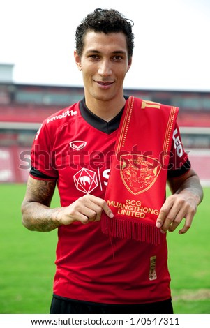NONTHABURI-THAILAND JANUARY 8:Jay Bothroyd  pose with scarf  during press conference as a new player for SCG Muangthong United at SCG Stadium on January 8,2014 in Nonthaburi,Thailand