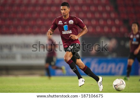 BANGKOK THAILAND-MARCH 09:Michael Murcy of Insee Police United. run with the ball during  the Thai Premier League Insee Police United.and Air Force F.C.at Thammasat Stadium on March 09, 2014,Thailand