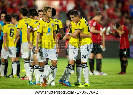 NONTHABURI THAILAND-MARCH 15:Sergio Suarez #20 of Police United celebrates with team-mate during Thai Premier League between Muangthong Utd.and Police United at SCG Stadium on March 15, 2014,Thailand
