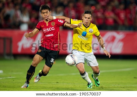 NONTHABURI THAILAND-MARCH 15:Dudu #11 (yellow) of Police United inaction during Thai Premier League between Muangthong Utd.and Police United at SCG Stadium on March 15, 2014,Thailand