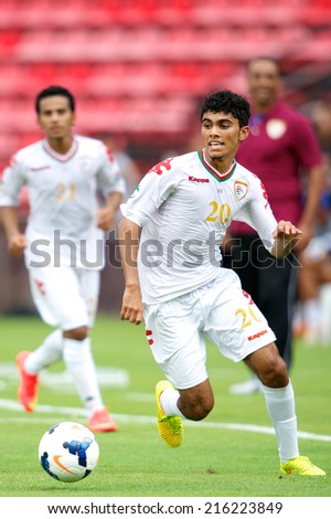 NONTHABURI THAILAND-SEPTEMBER 06:Salaah Said Salim Al Yahyaei of Oman run with the ball during the AFC U-16 Championship between Korea Republic and Oman at Muangthong Stadium on Sep 06, 2014,Thailand