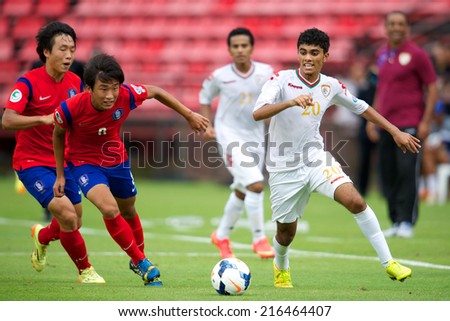 NONTHABURI THAILAND-SEPTEMBER 06:Salaah Said Salim Al Yahyaei (R) of Oman in action during the AFC U-16 Championship between Korea Republic and Oman at Muangthong Stadium on Sep 06, 2014 Thailand