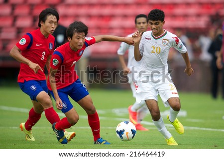 NONTHABURI THAILAND-SEPTEMBER 06:Salaah Said Salim Al Yahyaei #20(R) of Oman in action during the AFC U-16 Championship between Korea Republic and Oman at Muangthong Stadium on Sep 06, 2014 Thailand