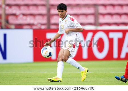 NONTHABURI THAILAND-SEPTEMBER 06:Salaah Said Salim Al Yahyaei of Oman run with the ball during the AFC U-16 Championship between Korea Republic and Oman at Muangthong Stadium on Sep 06, 2014,Thailand