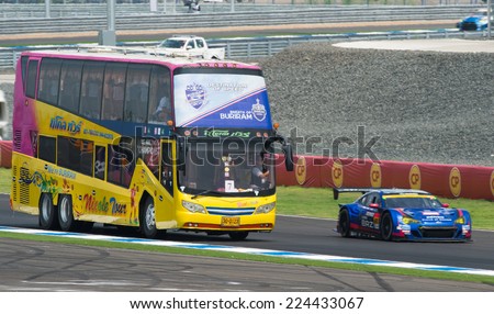 BURIRAM THAILAND-OCTOBER 5:Big bus for press drives during circuit safari the Autobacs Super GT Round7 Burirum United Super GT Raceat Chang International Circuit,on Oct 05,2014 in,Thailand