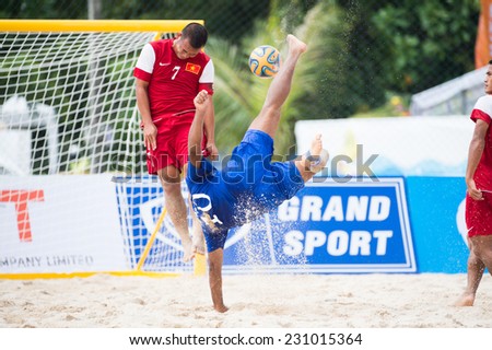 PHUKET THAILAND-NOVEMBER15:Mohammad Hussain of Kuwait bicycle kick during the Beach Soccer match between Kuwait and Vietnam the 2014 Asian Beach Games at Saphan Hin on November15,2014 in Thailand