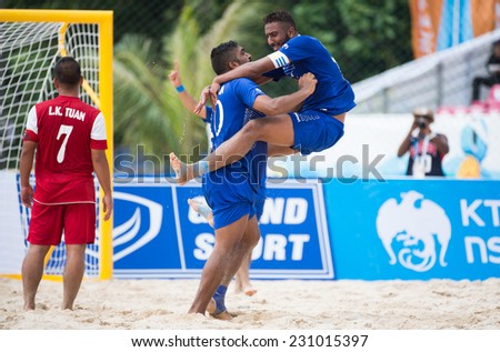 PHUKET THAILAND-NOVEMBER15:Yaqoub Abdulrahman (L)of Kuwait celebrate during the Beach Soccer match between Kuwait and Vietnam the 2014 Asian Beach Games at Saphan Hin on November15,2014 in Thailand