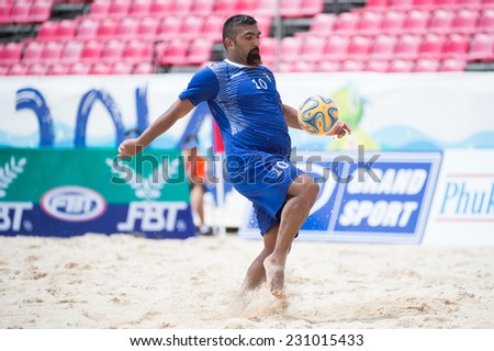 PHUKET THAILAND-NOVEMBER15:Mohammad Hussain of Kuwait in action during the Beach Soccer match between Kuwait and Vietnam the 2014 Asian Beach Games at Saphan Hin on November 15,2014 in Thailand