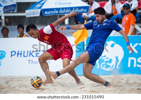 PHUKET THAILAND-NOVEMBER15:Mohammad Bu-Abbas (blue) of Kuwait in action during the Beach Soccer match between Kuwait and Vietnam the 2014 Asian Beach Games at Saphan Hin on November15,2014 in Thailand