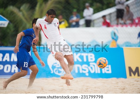 PHUKET THAILAND-NOVEMBER19:Mehdi HassanInoznri of  Iran in action during the Beach Soccer match between Thailand and Iran the 2014 Asian Beach Games at Saphan Hin on Nov 19,2014 in Thailand