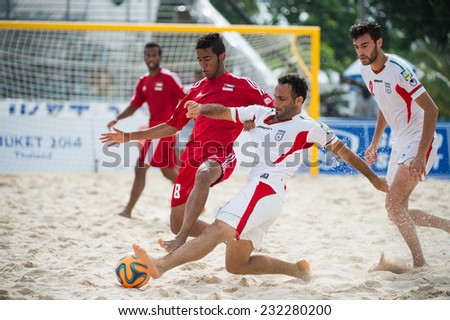PHUKET THAILAND-NOVEMBER20 :Farid Boulokbashi no.8 (white)of Iran in action during the Beach Soccer match between UAE and Iran the 2014 Asian Beach Games at Saphan Hin on Nov 20,2014 in Thailand