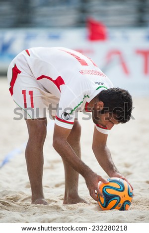 PHUKET THAILAND-NOVEMBER20 :Mohammad Ahmadzadeh of Iran in action during the Beach Soccer match between UAE and Iran the 2014 Asian Beach Games at Saphan Hin on Nov 20,2014 in Thailand