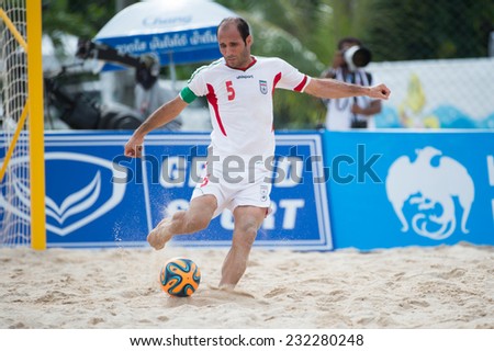 PHUKET THAILAND-NOVEMBER20 :Ali Naderi Hosseinabadi  of Iran in action during the Beach Soccer match between UAE and Iran the 2014 Asian Beach Games at Saphan Hin on Nov 20,2014 in Thailand