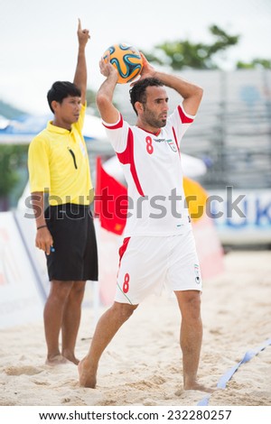 PHUKET THAILAND-NOVEMBER20 :Farid Boulokbashi no.8 of Iran in action during the Beach Soccer match between UAE and Iran the 2014 Asian Beach Games at Saphan Hin on Nov 20,2014 in Thailand