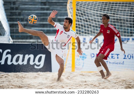 PHUKET THAILAND-NOVEMBER20 :MOKHTARI H Mohammadali  (L) of Iran in action during the Beach Soccer match between UAE and Iran the 2014 Asian Beach Games at Saphan Hin on Nov 20,2014 in Thailand