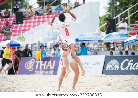 PHUKET THAILAND-NOVEMBER20 :Farid Boulokbashi no.8 of Iran celebrates during the Beach Soccer match between UAE and Iran the 2014 Asian Beach Games at Saphan Hin on Nov 20,2014 in Thailand