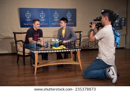 BANGKOK, THAILAND - DECEMBER 03: Fabio Cannavaro  (L)speaks to the media during a press conference in the lead up to the Global Legends Series, at the Swissotel, on Dec3, 2014 in Bangkok, Thailand.
