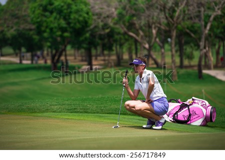 PATTAYA, THAILAND-FEB 26: Brittany Lang of USA lines up her putt during the 1st green day one of the Honda LPGA Thailand 2015 at Siam Country Club, Pattaya on Feb 26,2015 in Thailand.