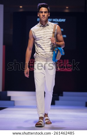 NONTHABURI THAILAND- MARCH 12:A model walks the runway the Everyday Holiday show during The BIFF&BIL Bangkok international Fashion Fair 2015 at IMPACT Challenger Hall on March 12,2015 in,Thailand