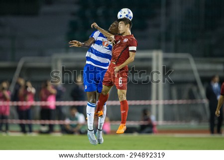 BANGKOK,THAILAND-July8:Sarach Yooyen (RED) of Thailand All Stars in action during The Reading FC Thailand Tour 2015 Thailand All Stars and Reading FC at National Stadium on July 8, 2015,Thailand.